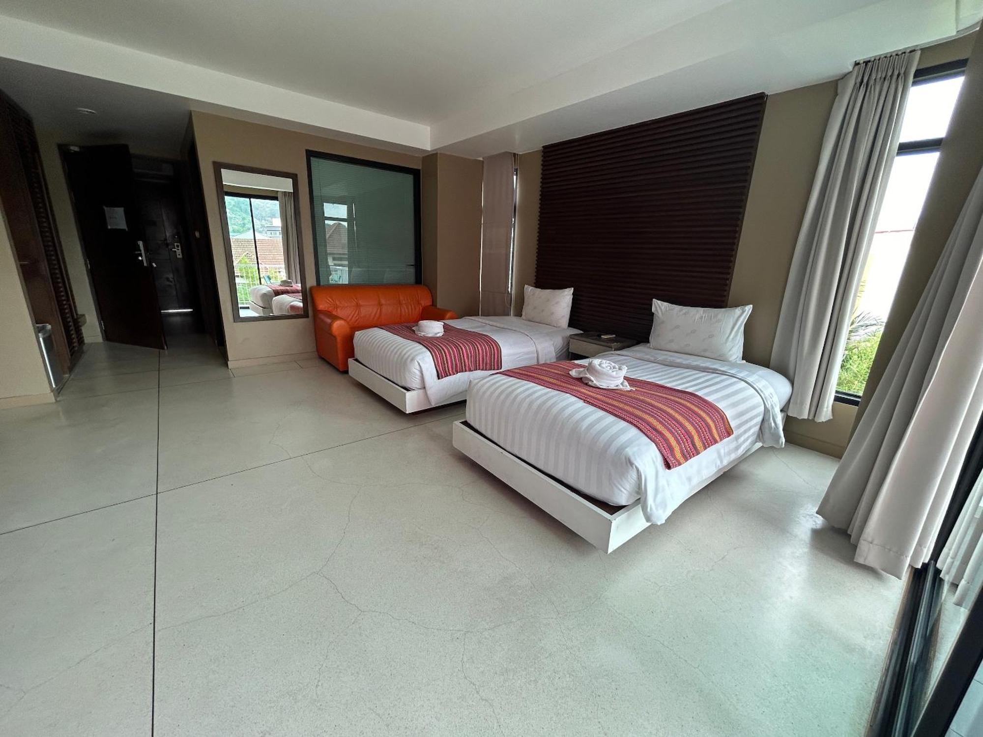 Coco Boutique Hotel Patong Rum bild