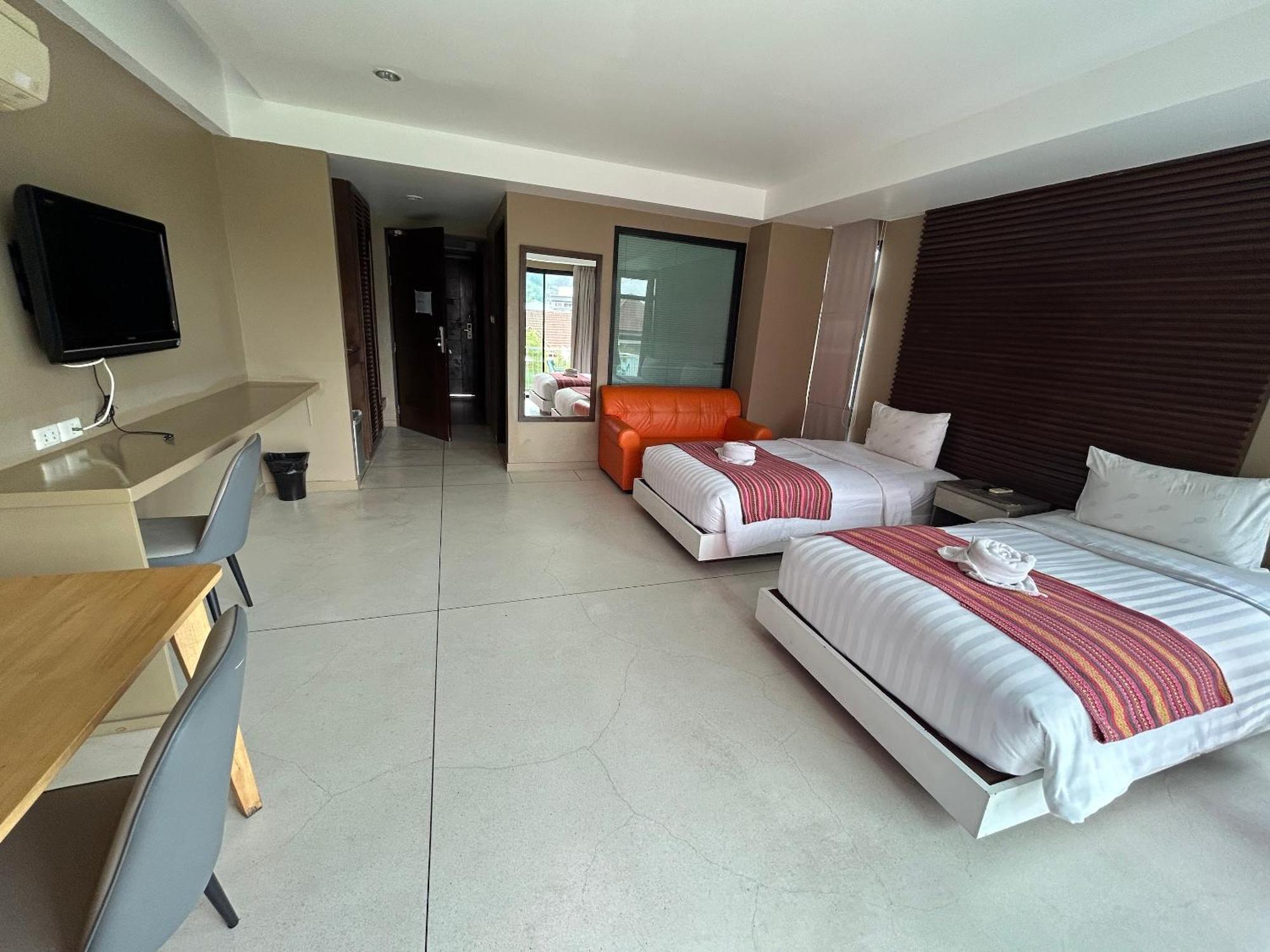 Coco Boutique Hotel Patong Rum bild